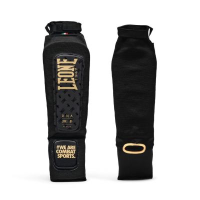 Leone 1947 Espinilleras MMA DNA Preto-Dourado