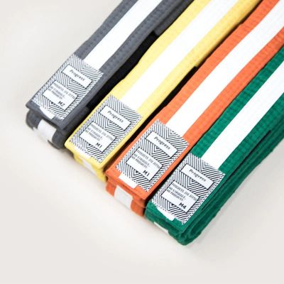 Progress Jiu Jitsu Kids IBJJF Graded BJJ Belts Naranja-Blanco