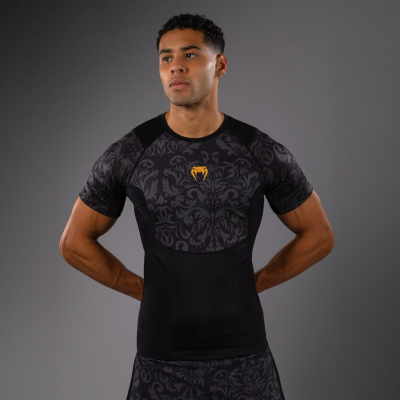 Venum X Topuria Unmatched Edition S/S Rashguard Svart-Gold