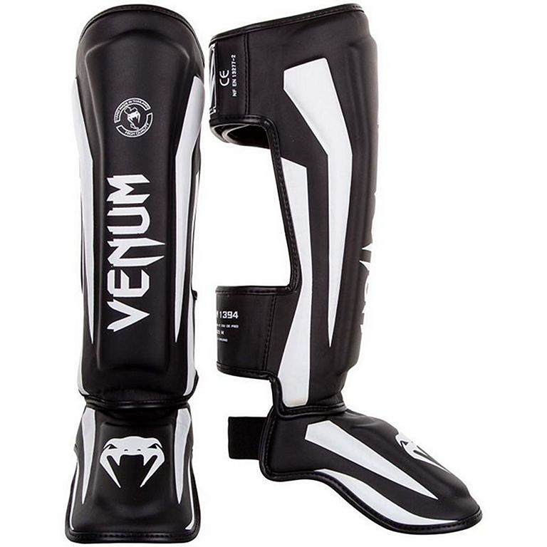 Venum Espinilleras Elite Standup - Oro/Negro